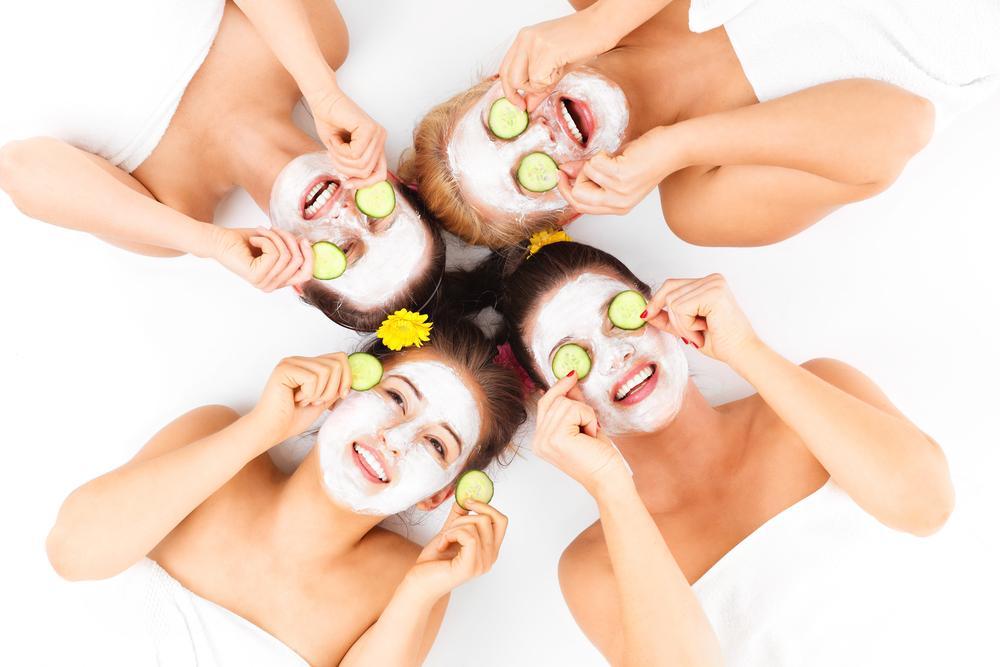 Group of girls trying ayurvedic face masks