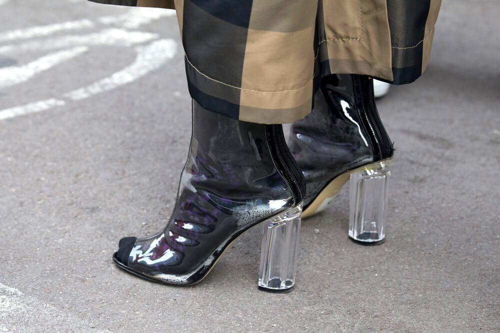 Woman's feet in glass heels