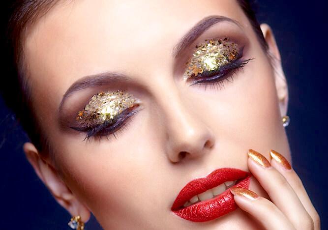 Glitter and gold-leaf eye makeup