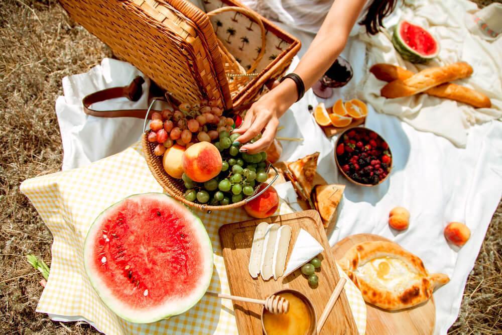 Flat lay of picnic foods outdoors