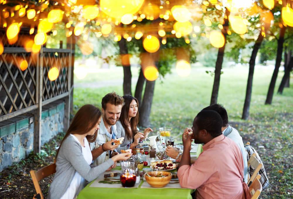 Friends enjoying dinner outdoors