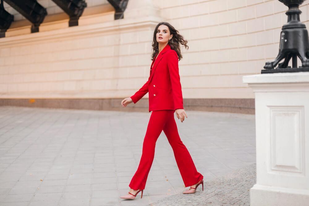 Woman in red tailored suit