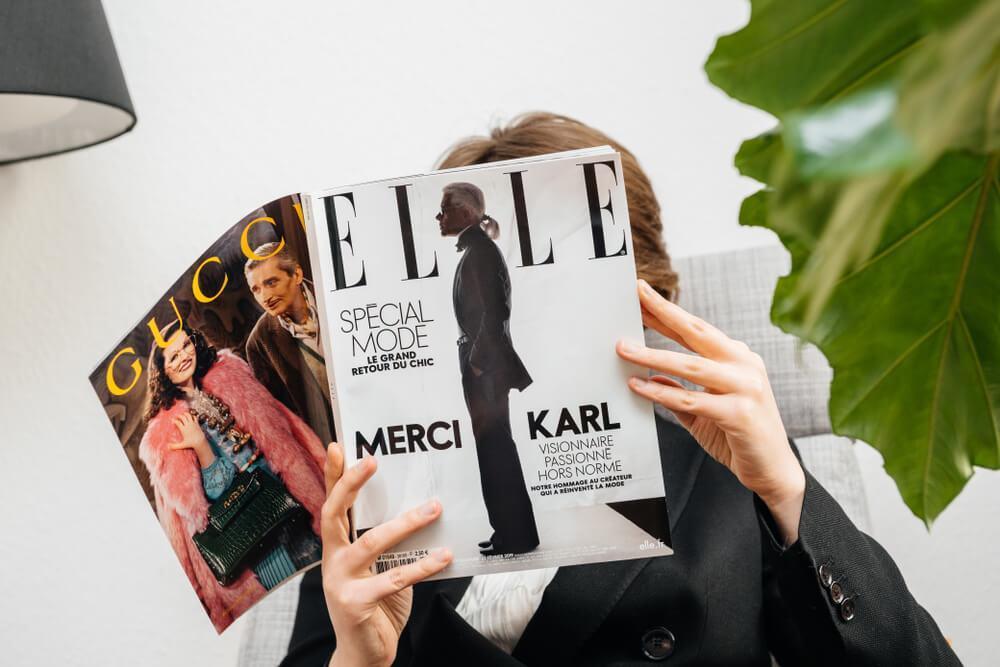 Woman reading Elle Magazine