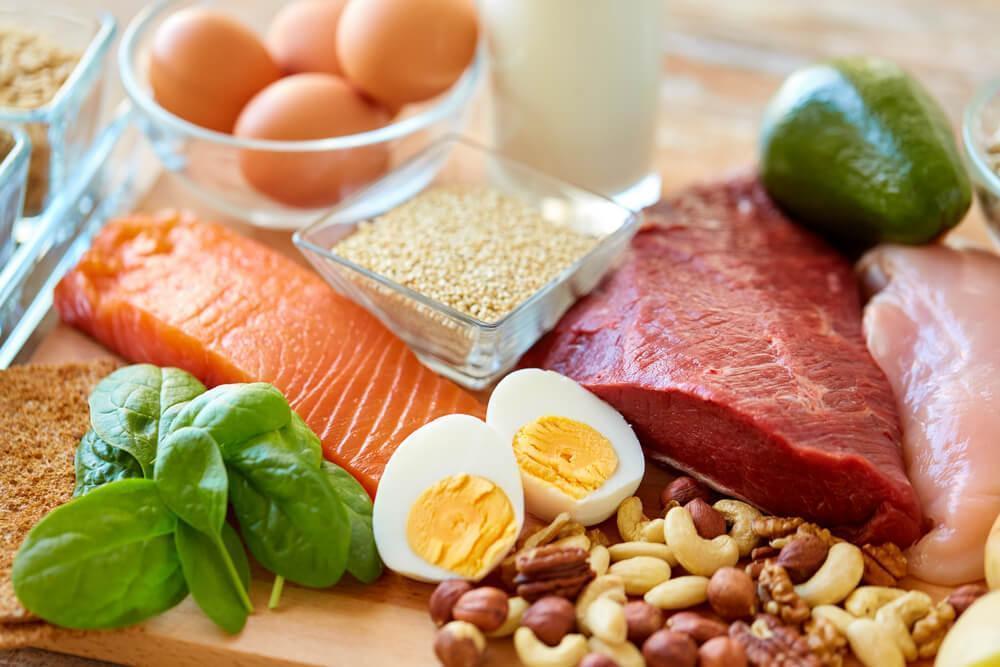 Healthy foods, including eggs, spinach, salmon and nuts