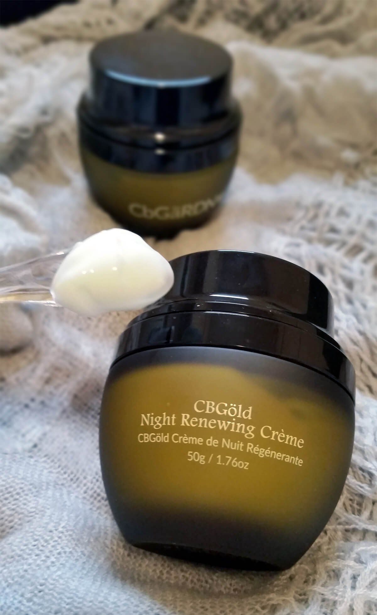 CBGold Night Renewing Creme with product on applicator