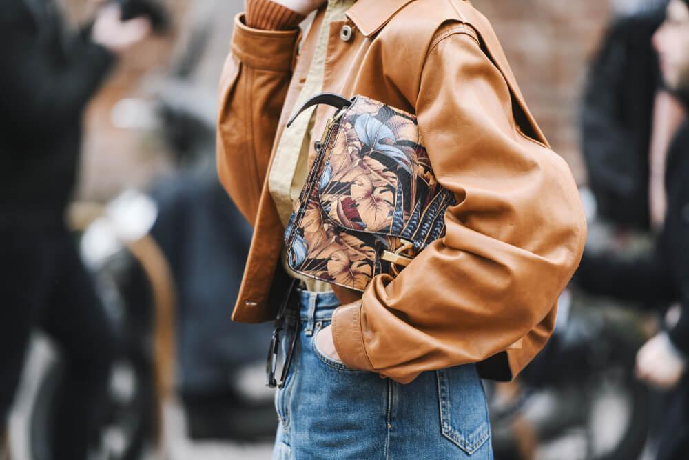 Woman wearing leather jacket and jeans