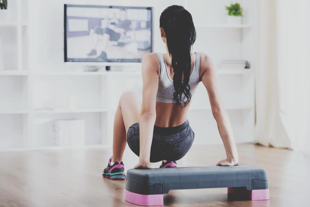 Woman exercising at home