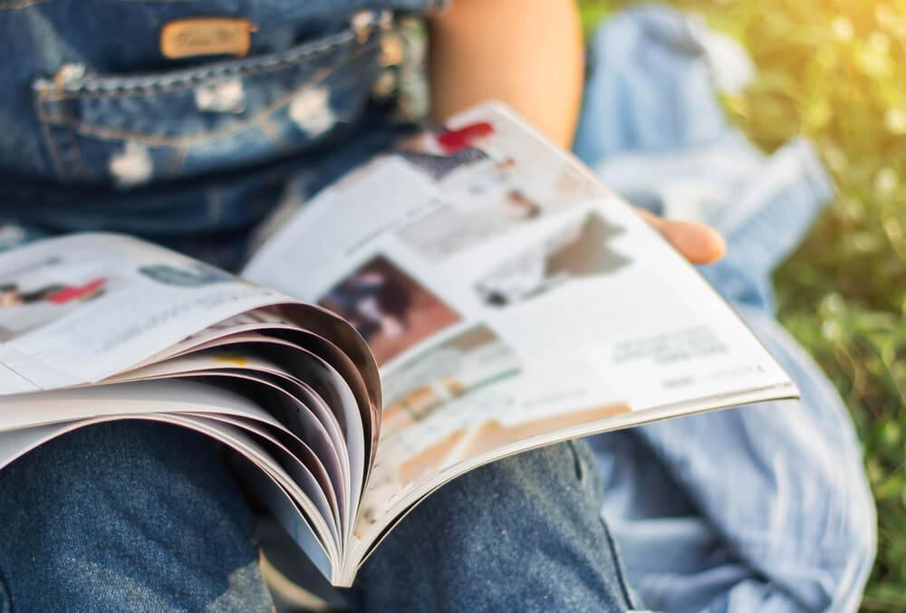 Woman reading magazine