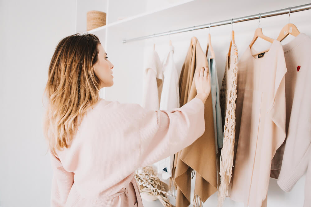 woman looking at clothes